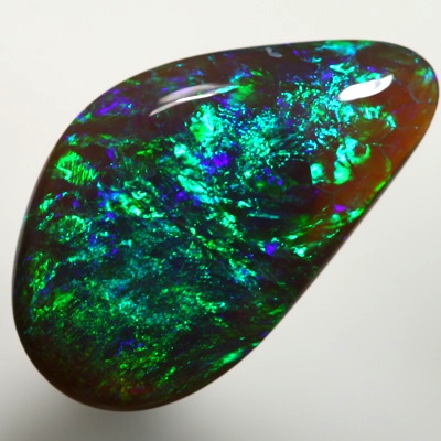 SOLID BLACK CRYSTAL OPAL Sparkling greens and blues, 3 dimensional pattern. SEE VIDEO